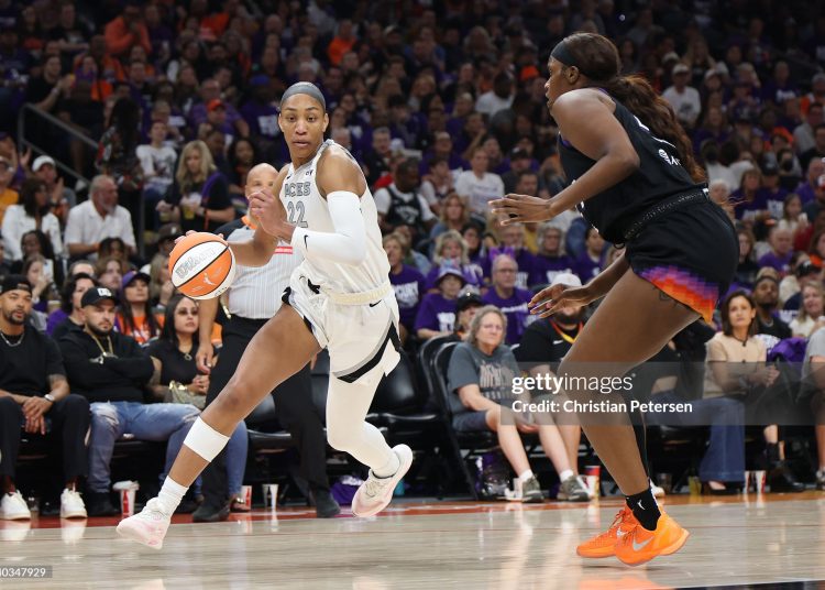 A'ja Wilson #22 of the Las Vegas Aces drives to the basket against Kalani Brown #21 of the Phoenix Mercury in the third quarter during Game Four of the 2025 WNBA Playoffs  (Photo by Christian Petersen/Getty Images)