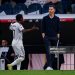 Vinicius Junior of Real Madrid protests following his replacement with Xabi Alonso, head coach of Real Madrid, during the LaLiga EA Sports football match between Real Madrid CF and FC Barcelona (Photo by Alberto Gardin/NurPhoto via Getty Images)