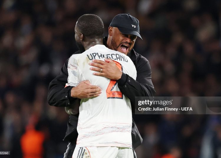 Vincent Kompany, Head Coach of Bayern Munich, and Dayot Upamecano of Bayern Munich celebrate after the team's victory in the UEFA Champions League 2025/26 League Phase MD4 match between Paris Saint-Germain and FC Bayern Münch (Photo by Julian Finney - UEFA/UEFA via Getty Images)