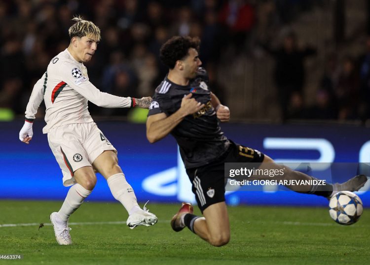 Chelsea's Argentinian midfielder #19 Alejandro Garnacho shoots and scores the team's second goal during the UEFA Champions League league phase football match between Qarabag and Chelssea (Photo by GIORGI ARJEVANIDZE/AFP via Getty Images)