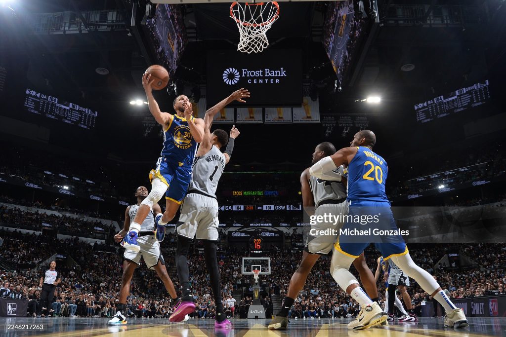 Stephen Curry drives to the basket