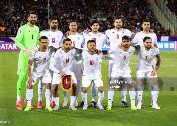 Iran's national footbal team pose for a group picture before the FIFA World Cup 2026 Asia zone qualifiers group A football match between Iran and Uzbekistan (Photo by -/AFP via Getty Images)