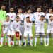 Iran's national footbal team pose for a group picture before the FIFA World Cup 2026 Asia zone qualifiers group A football match between Iran and Uzbekistan (Photo by -/AFP via Getty Images)