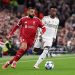 Mohamed Salah of Liverpool breaks away from Vinicius Junior of Real Madrid during the UEFA Champions League 2025/26 League Phase MD4 match between Liverpool FC and Real Madrid C.F. (Photo by Michael Regan/Getty Images)