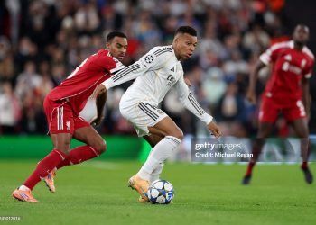 Kylian Mbappe of Real Madrid is challenged by Ryan Gravenberch of Liverpool during the UEFA Champions League 2025/26 League Phase MD4 match between Liverpool FC and Real Madrid C.F (Photo by Michael Regan/Getty Images)