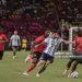 Argentina's forward #10 Lionel Messi (2nd R) vies for the ball with Angola's #3 Jonathan Buatu (R) and Angola's #6 Gaspar Kialonda (4th L) during the friendly match between Angola and Argentina in Luanda on November 14, 2025. Football icon Lionel Messi created the first goal and scored the second as world champions Argentina beat Angola 2-0 in an international friendly (Photo by JULIO PACHECO NTELA/AFP via Getty Images)