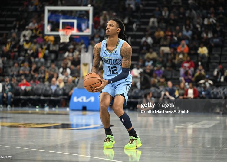 Ja Morant #12 of the Memphis Grizzlies lines up to shoot a three-pointer (Photo by Matthew A. Smith/Getty Images)