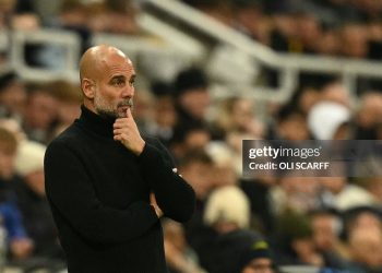 Manchester City's Spanish manager Pep Guardiola looks on during the English Premier League football match between Newcastle United and Manchester City (Photo by Oli SCARFF / AFP via Getty Images)