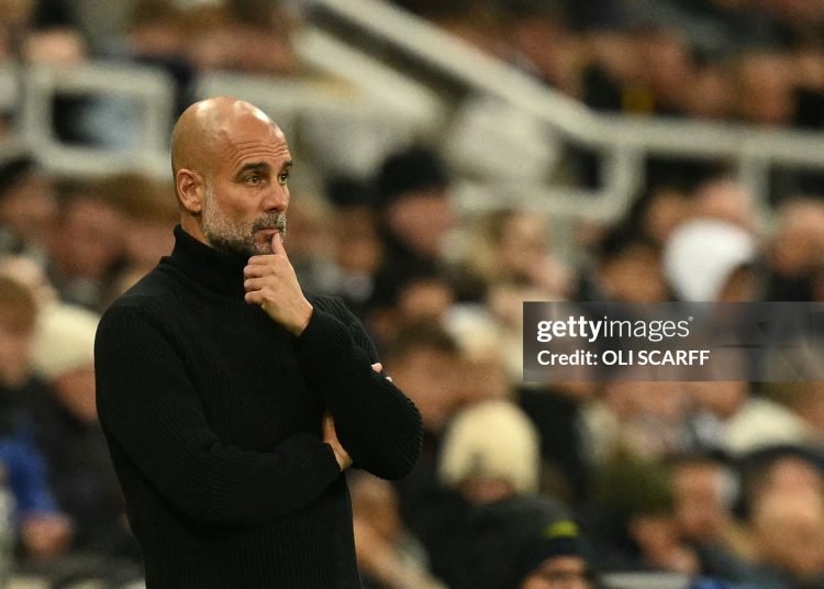 Manchester City's Spanish manager Pep Guardiola looks on during the English Premier League football match between Newcastle United and Manchester City (Photo by Oli SCARFF / AFP via Getty Images)