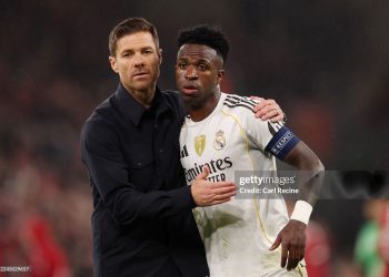 Xabi Alonso, Head Coach of Real Madrid, consoles Vinicius Junior of Real Madrid after the team's defeat in the UEFA Champions League 2025/26 League Phase MD4 match between Liverpool FC and Real Madrid C.F. (Photo by Carl Recine/Getty Images)