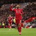 Mohamed Salah of Liverpool celebrates scoring his team's first goal during the Premier League match between Liverpool and Aston Villa (Photo by Liverpool FC/Liverpool FC via Getty Images)
