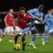 Ryan Hardie of Wrexham and Brandon Thomas-Asante of Coventry City battle for possession during the Sky Bet Championship match between Wrexham AFC and Coventry City (Photo by Carl Recine/Getty Images)