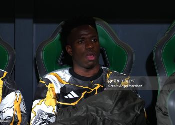 Vinicius Junior of Real Madrid looks on from the bench prior to the LaLiga EA Sports match between Elche CF and Real Madrid CF (Photo by Angel Martinez/Getty Images)
