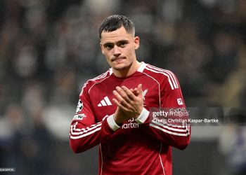 Florian Wirtz of Liverpool acknowledges the fans after the team's victory during the UEFA Champions League 2025/26 League Phase MD3 match between Eintracht Frankfurt and Liverpool FC (Photo by Christian Kaspar-Bartke/Getty Images)