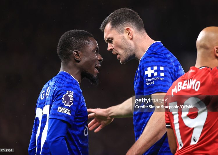 Idrissa Gueye of Everton clashes with teammate Michael Keane resulting in a red card for Gueye during the Premier League match between Manchester United and Everton at Old Trafford (Photo by Simon Stacpoole/Offside/Offside via Getty Images)