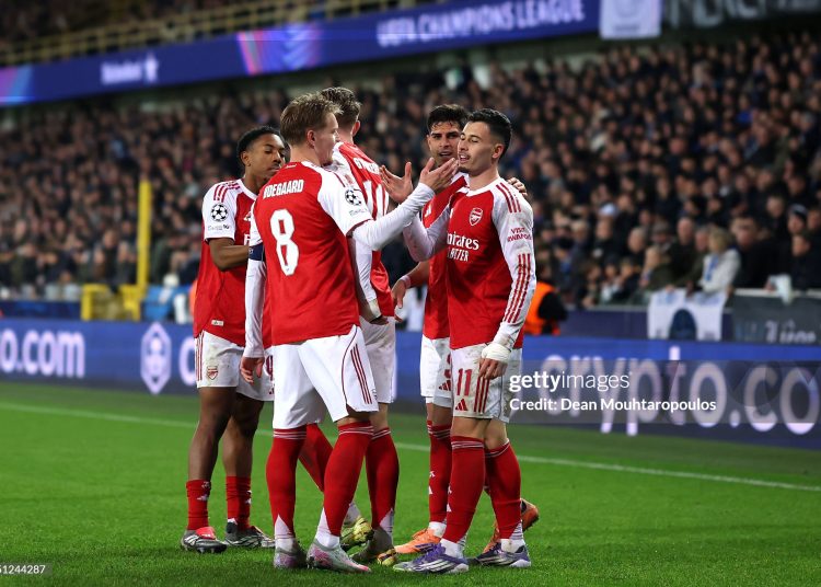 Gabriel Martinelli of Arsenal celebrates scoring his team's third goal with teammate Martin Odegaard during the UEFA Champions League 2025/26 League Phase MD6 match between Club Brugge KV and Arsenal FC (Photo by Dean Mouhtaropoulos/Getty Images)