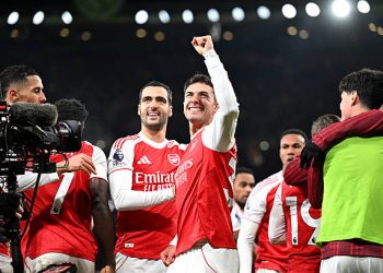 Martin Zubimendi of Arsenal celebrates with teammates after scoring his team's second goal (Photo by Stuart MacFarlane/Arsenal FC via Getty Images)