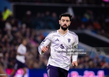 Bruno Fernandes of Manchester United in action during the Premier League match between Aston Villa and Manchester United at Villa Park (Photo by Ash Donelon/Manchester United via Getty Images)