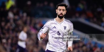 Bruno Fernandes of Manchester United in action during the Premier League match between Aston Villa and Manchester United at Villa Park (Photo by Ash Donelon/Manchester United via Getty Images)