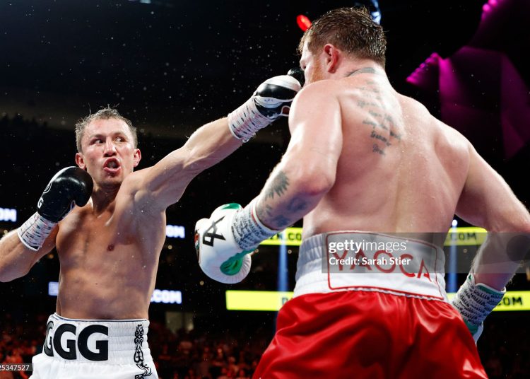 Canelo Alvarez (red trunks) trades punches with Gennadiy Golovkin (white trunks) in the fight for the Super Middleweight Title (Photo by Sarah Stier/Getty Images)