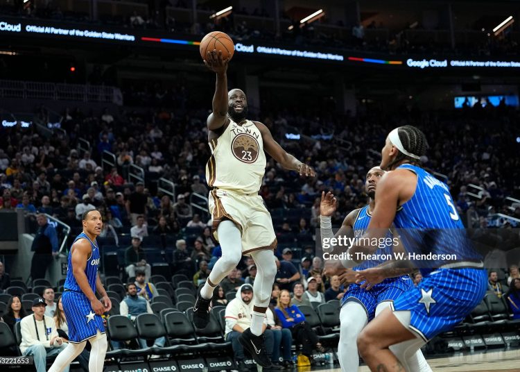 Draymond Green #23 of the Golden State Warriors goes in for a layup against the Orlando Magic in the second half (Photo by Thearon W. Henderson/Getty Images)