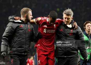 Alexander Isak of Liverpool receives medical treatment after he is fouled by Micky van de Ven of Tottenham Hotspur (not pictured) during the Premier League match between Tottenham Hotspurs and Liverpool (Photo by Liverpool FC/Liverpool FC via Getty Images)