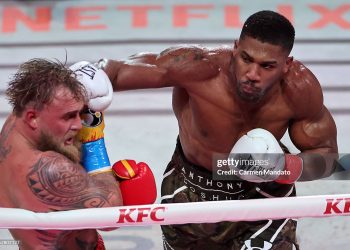 L-R) Jake Paul fights Anthony Joshua in their heavyweight bout during Jake Paul v Anthony Joshua (Photo by Carmen Mandato/Getty Images for Netflix)