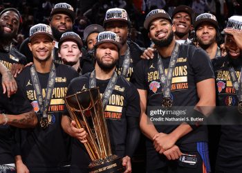 The New York Knicks pose for a photo with the 2025 Emirates NBA Cup Championship Trophy Photo Courtesy: Getty Images
