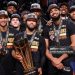 The New York Knicks pose for a photo with the 2025 Emirates NBA Cup Championship Trophy Photo Courtesy: Getty Images