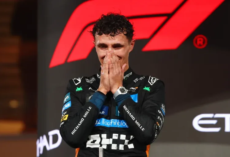 Lando Norris after winning on podium . Photo Courtesy : Aljazeera