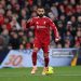 Mohamed Salah of Liverpool runs with the ball during the Premier League match between Liverpool and Brighton & Hove Albion at Anfield (Photo by Michael Regan/Getty Images)