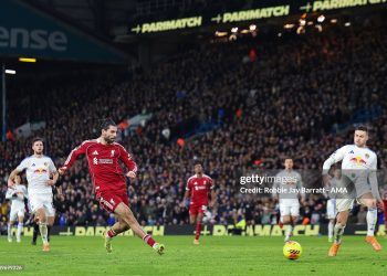 Dominik Szoboszlai of Liverpool scores a goal to make it 2-3  during the Premier League match between Leeds United and Liverpool (Photo by Robbie Jay Barratt - AMA/Getty Images)