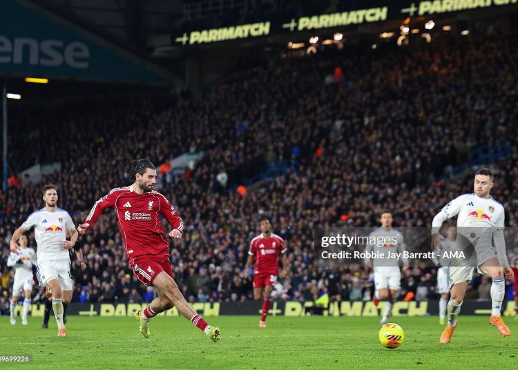 Dominik Szoboszlai of Liverpool scores a goal to make it 2-3  during the Premier League match between Leeds United and Liverpool (Photo by Robbie Jay Barratt - AMA/Getty Images)