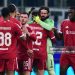 Liverpools players celebrate after winning the UEFA Champions League phase day 6 football match between Inter Milan and Liverpool (Photo by Stefano RELLANDINI / AFP via Getty Images)
