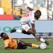 Mali's forward #17 Lassine Sinayoko (R) fights for the ball with Zambia's midfielder #17 Kings Kangwa (L) during the Africa Cup of Nations (AFCON) Group A football match between Mali and Zambia (Photo by Abdel Majid BZIOUAT / AFP via Getty Images)
