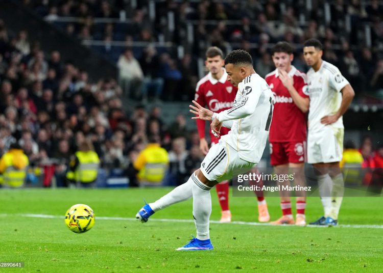 Kylian Mbappe of Real Madrid scores his team's second goal from the penalty spot during the LaLiga EA Sports match between Real Madrid CF and Sevilla FC (Photo by Angel Martinez/Getty Images)