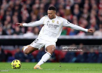 Kylian Mbappe of Real Madrid scores his team's first goal during the LaLiga EA Sports match between Athletic Club and Real Madrid CF (Photo by Ion Alcoba Beitia/Getty Images)