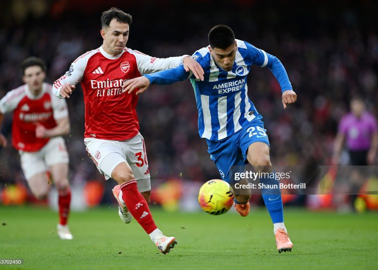 Martin Zubimendi of Arsenal and Diego Gomez of Brighton & Hove Albion battle for possession during the Premier League match between Arsenal and Brighton & Hove Albion (Photo by Shaun Botterill/Getty Images)