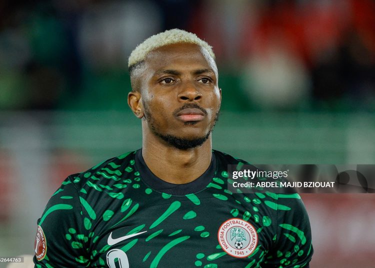 Nigeria's forward #09 Victor Osimhen looks on prior the Africa Cup of Nations (CAN) Group C football match between Nigeria and Tanzania (Photo by Abdel Majid BZIOUAT / AFP via Getty Images)