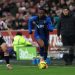 Antoine Semenyo of AFC Bournemouth runs with the ball whilst under pressure from Yehor Yarmolyuk of Brentford during the Premier League match between Brentford and Bournemouth  (Photo by Eddie Keogh/Getty Images)