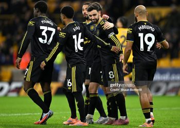 Bruno Fernandes of Manchester United celebrates scoring his team's fourth goal with teammates during the Premier League match between Wolverhampton Wanderers and Manchester United (Photo by Shaun Botterill/Getty Images)