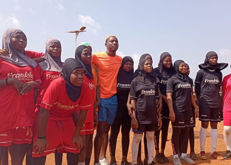 Maxwell Woledzi (in orange shirt) with participants in 2025 Hijab Project