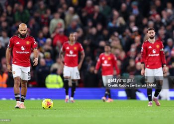 A dejected Bryan Mbeumo of Manchester United  and team mates during the Premier League match between Manchester United and Bournemouth at Old Trafford (Photo by Robbie Jay Barratt - AMA/Getty Images)