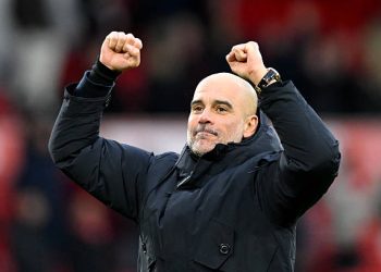 Pep Guardiola, Manager of Manchester City, celebrates with the fans after the Premier League match between Nottingham Forest and Manchester City at the City Ground on December 27, 2025 in Nottingham, England. (Photo by Clive Mason/Getty Images)