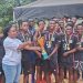 Kwamang boys; Winners of the boys division posing with the trophy