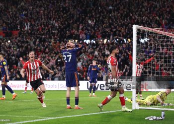 Nick Woltemade reacts to conceding an own goal and Sunderland's first goal (Photo by Carl Recine/Getty Images)