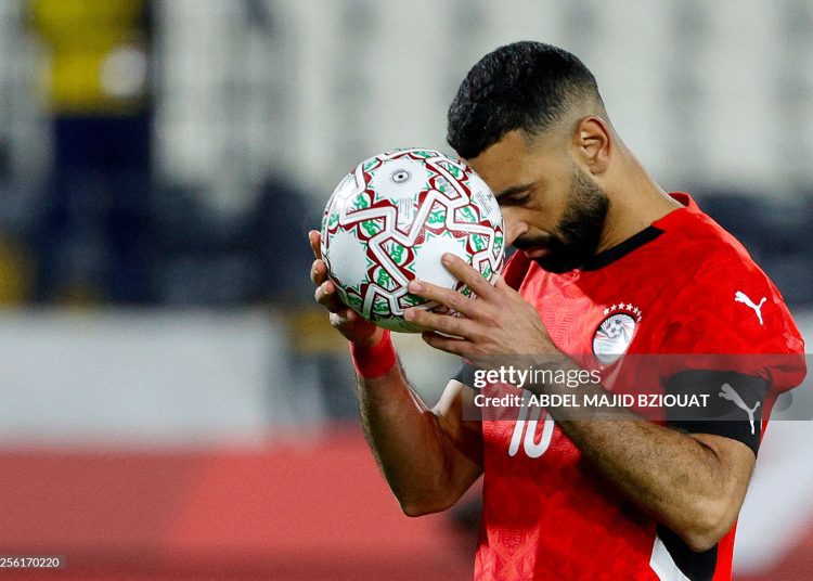 Egypt's forward #10 Mohamed Salah prepares to take a penalty during the Africa Cup of Nations (CAN) third place football match between Egypt and Nigeria (Photo by Abdel Majid BZIOUAT / AFP via Getty Images)