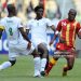 (L-R) Mahamoudou Kere, Florent Rouamba of Burkina Faso challenge Matthew Amoah of Ghana during the Africa Cup of Nations Group B match between Burkina Faso and Ghana (Photo by Lefty Shivambu/Gallo Images/Getty Images)