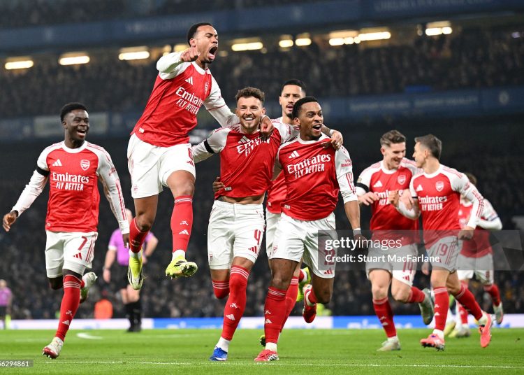 Ben White of Arsenal celebrates scoring his team's first goal with teammates during the Carabao Cup Semi Final First Leg match between Chelsea and Arsenal (Photo by Stuart MacFarlane/Arsenal FC via Getty Images)