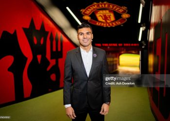 Casemiro of Manchester United poses at Old Trafford after announcing he will leave the club at the end of the season, upon the expiry of his contract (Photo by Ash Donelon/Manchester United via Getty Images)